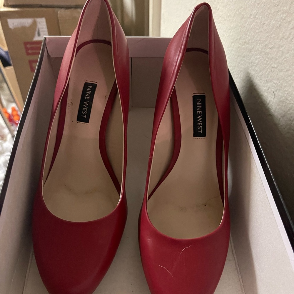 Red leather pumps with small platform